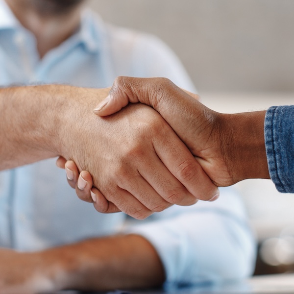 Close Up Of Handshake In The Office